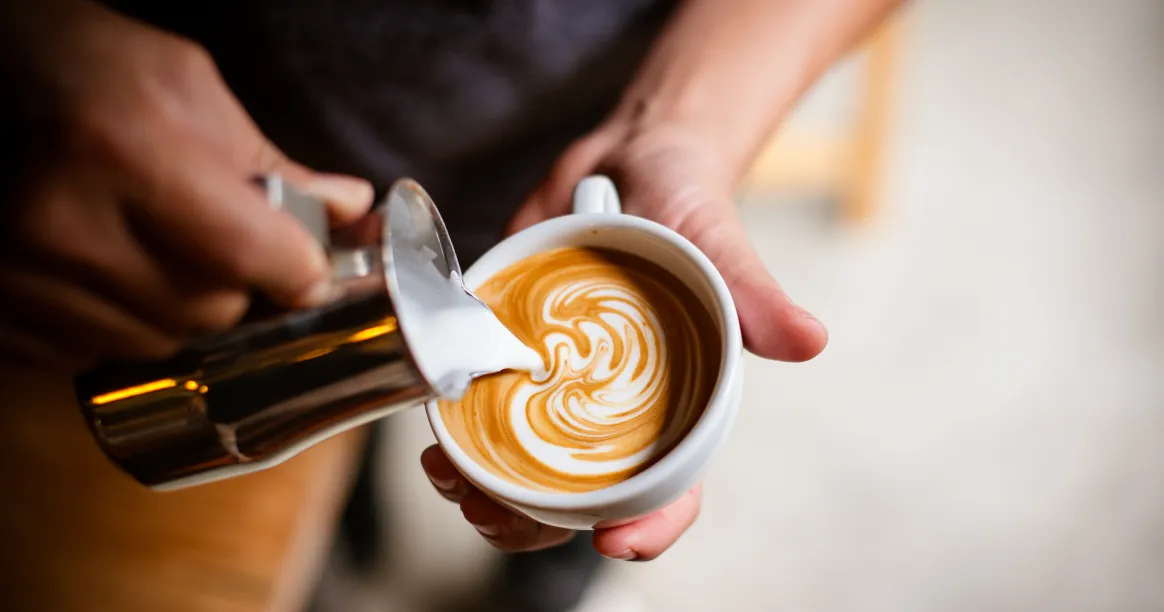 Coffee and intermittent fasting guide - woman enjoying black coffee during fasting window with health benefits