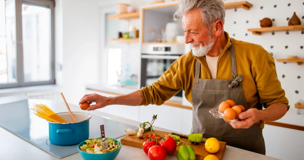 Woman preparing glycemic index-friendly meal with fresh vegetables whole grains for blood sugar control