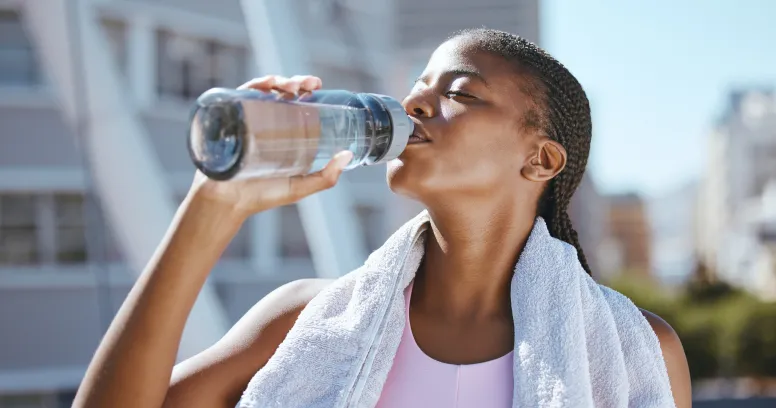 Staying hydrated with water bottle during intermittent fasting for optimal health