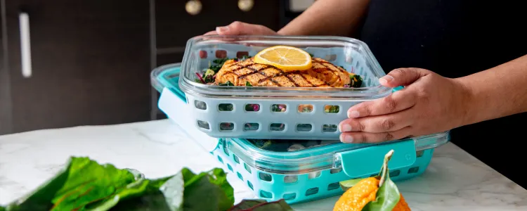 Woman choosing healthy lunch foods for intermittent fasting meal plan adherence