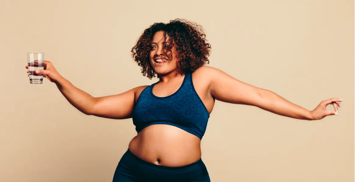 Woman exploring intermittent fasting and ketosis for fat-burning and weight loss transformation
