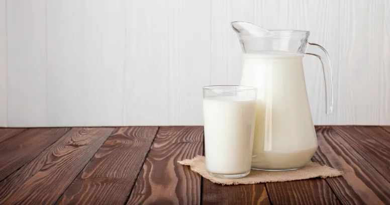 Glass of cow's milk with calcium vitamin D and protein nutrients for bone health and muscle recovery