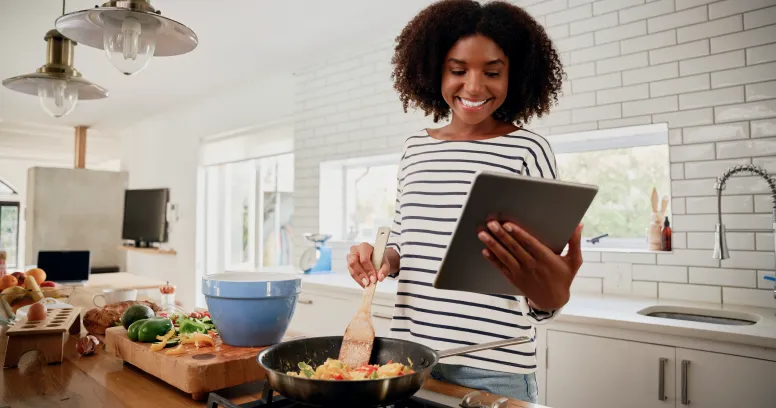 Woman selecting fresh vegetables mindfully preparing healthy meal for conscious nutrition and body awareness