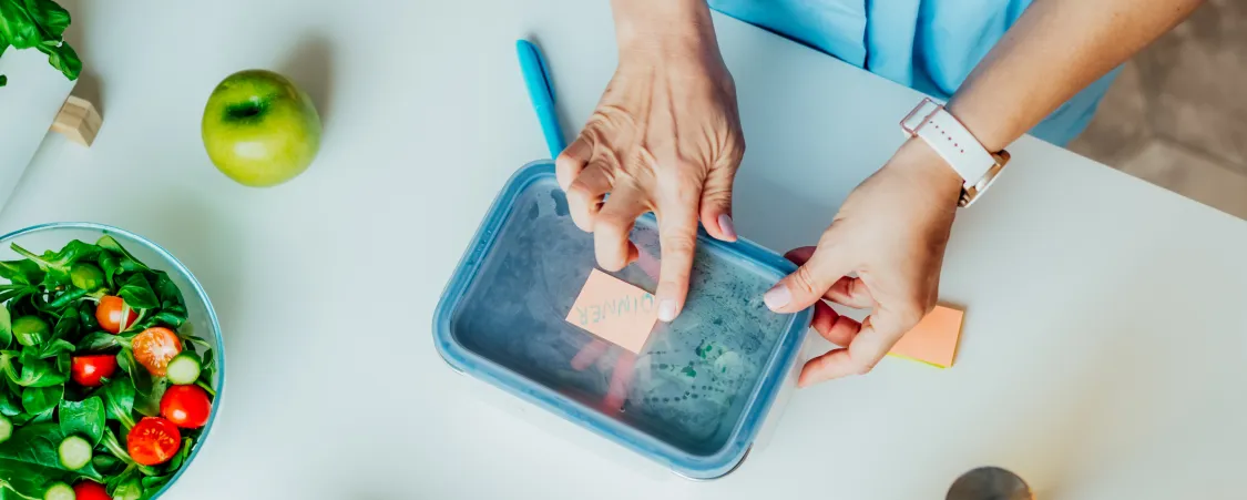 Step-by-step meal planning guide showing meal prep containers and healthy meal organization for better nutrition
